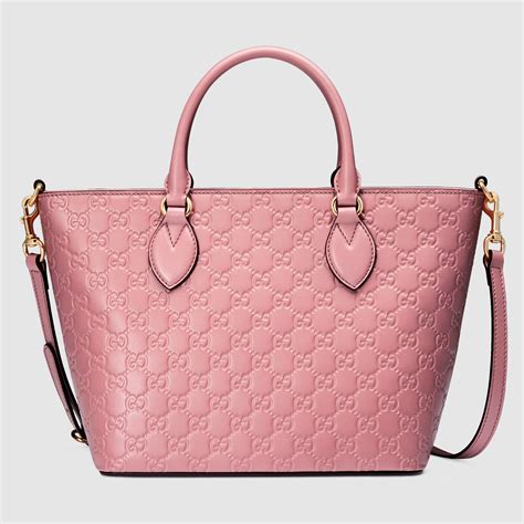 gucci powder pink leather tote handbag|Gucci black canvas tote bag.